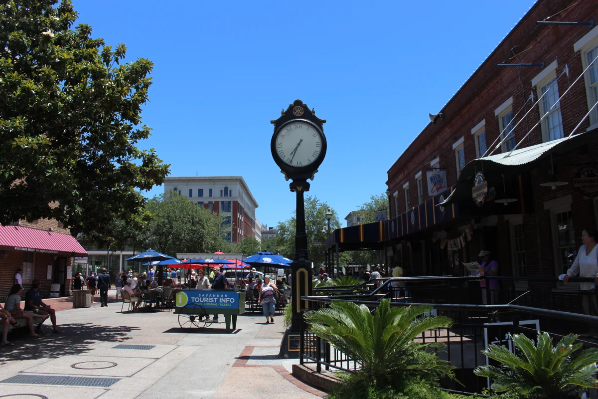 The street clock at City Market, inside the downtown to-go cup zone where ghost tours in Savannah GA meet