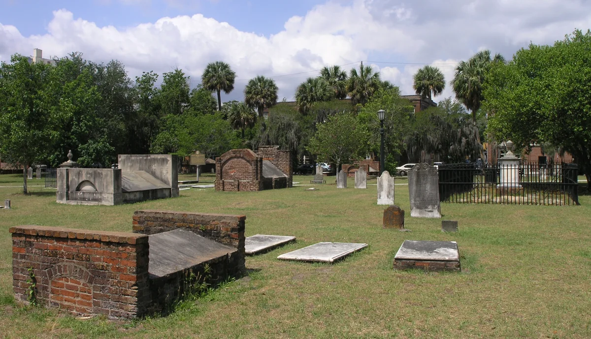 Tombs and live oaks in Colonial Park Cemetery, the burial ground at the heart of ghost tours in Savannah GA